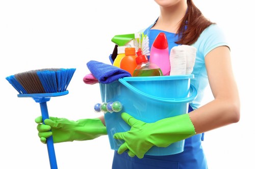 Cleaner preparing bedding and guest rooms in an Edgware rental property