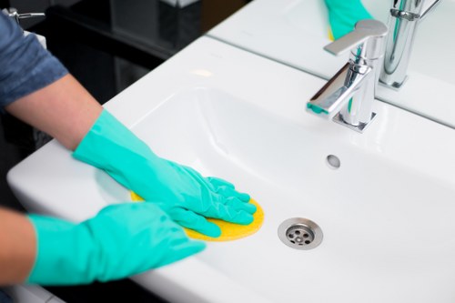 Detailed cleaning of renovated kitchen surfaces and fittings