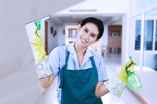 Local cleaners working in a residential building in Edgware